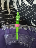 Fluffy pink green frog